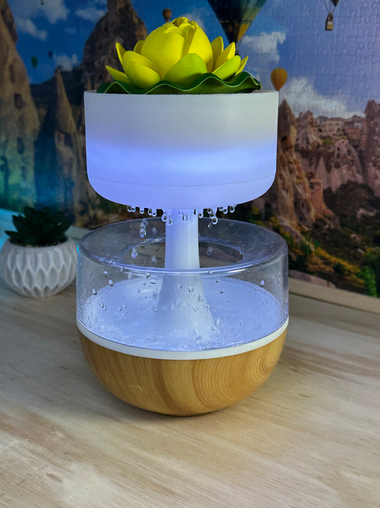 Luz LED ambiental con efecto lluvia.
